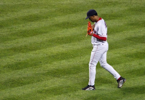 BRONX, NY – OCTOBER 16: Pedro Martinez #45 of the Boston Red Sox leaves the game in the eighth inning after giving up three runs to the New York Yankees during game 7 of the American League Championship Series on October 16, 2003 at Yankee Stadium in the Bronx, New York. (Photo by Doug Pensinger/Getty Images)