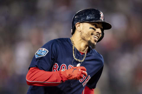 LOS ANGELES, CA – OCTOBER 28: Mookie Betts #50 of the Boston Red Sox reacts as he rounds the bases after hitting a solo home run during the sixth inning of game five of the 2018 World Series against the Los Angeles Dodgers on October 28, 2018 at Dodger Stadium in Los Angeles, California. (Photo by Billie Weiss/Boston Red Sox/Getty Images)