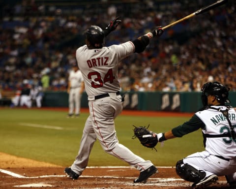 Boston’s David Ortiz watches the first of his two home runs during Friday night’s game against Tampa Bay at Tropicana Field in St. Petersburg, Florida on August 4, 2006. (Photo by J. Meric/Getty Images)