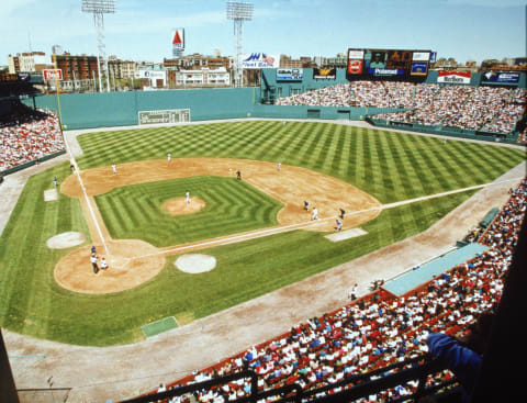 View of a baseball game between the Boston Red Sox and the Toronto Blue Jays, and of the Green Monster left-field wall, from the upper deck at Fenway Park, Boston, Massachusetts, 1994. American baseball player Joe Carter is at bat for the Blue Jays. (Photo by Photo File/Getty Images)