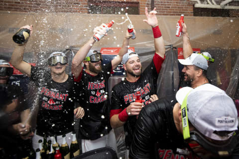 BOSTON, MA – OCTOBER 11: Tanner Houck #90, Chris Sale #41, Kevin Plawecki #25, and Kyle Schwarber #18 of the Boston Red Sox celebrate with champagne in the clubhouse after winning game four of the 2021 American League Division Series against the Tampa Bay Rays to clinch the series at Fenway Park on October 11, 2021 in Boston, Massachusetts. (Photo by Billie Weiss/Boston Red Sox/Getty Images)