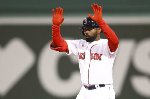 BOSTON, MA - MAY 19: Jackie Bradley Jr. #19 of the Boston Red Sox reacts after hitting an RBI-double in the sixth inning of a game against the Seattle Mariners at Fenway Park on May 19, 2022 in Boston, Massachusetts. (Photo by Adam Glanzman/Getty Images)