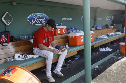 BOSTON, MA - JULY 24: Bobby Dalbec #29 of the Boston Red Sox sits alone in the dugout following their 8-4 loss to the Toronto Blue Jays at Fenway Park on July 24, 2022 in Boston, Massachusetts. (Photo By Winslow Townson/Getty Images)