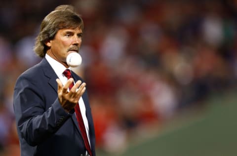 BOSTON, MA - SEPTEMBER 26: Former Boston Red Sox player Dennis Eckersley is honored during a ceremony for the All Fenway Park Team prior to the game against the Tampa Bay Rays on September 26, 2012 at Fenway Park in Boston, Massachusetts. (Photo by Jared Wickerham/Getty Images)