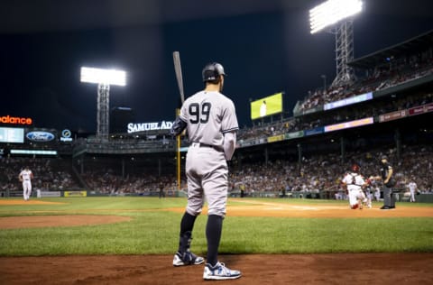 BOSTON, MA - SEPTEMBER 13: Aaron Judge #99 of the New York Yankees warms up on deck during the first inning of a game against the Boston Red Sox on September 13, 2022 at Fenway Park in Boston, Massachusetts.(Photo by Billie Weiss/Boston Red Sox/Getty Images)