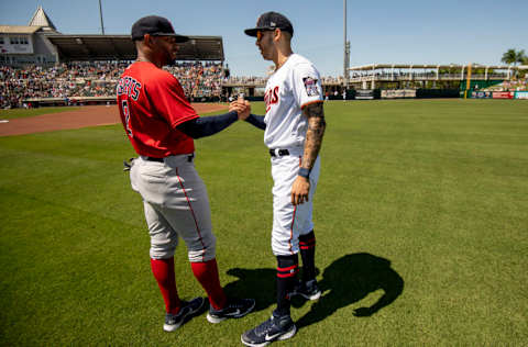 FT. MYERS, FL - MARCH 27: Xander Bogaerts #2 of the Boston Red Sox greets Carlos Correa #4 of the Minnesota Twins before a Grapefruit League game on March 27, 2022 at CenturyLink Sports Complex in Fort Myers, Florida. (Photo by Billie Weiss/Boston Red Sox/Getty Images)