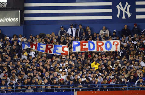 BRONX, NY - OCTOBER 18: The New York Yankees fans in the bleachers hold up a sign asking where Boston Red Sox pitcher Pedro Martinez is during game 1 of the Major League Baseball World Series between the New York Yankees and the Florida Marlins on October 18, 2003 at Yankee Stadium in the Bronx, New York. The Marlins won 3-2. (Photo by Ezra Shaw/Getty Images)