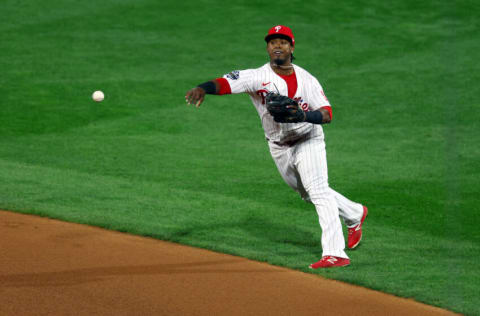 PHILADELPHIA, PENNSYLVANIA - NOVEMBER 02: Jean Segura #2 of the Philadelphia Phillies fields a hit by Alex Bregman #2 of the Houston Astros during the first inning in Game Four of the 2022 World Series at Citizens Bank Park on November 02, 2022 in Philadelphia, Pennsylvania. (Photo by Elsa/Getty Images)