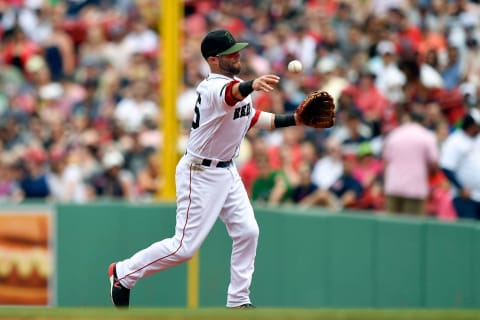 May 26, 2018; Boston, MA, USA; Boston Red Sox second baseman Dustin Pedroia (15) throws to first base during the third inning against the Atlanta Braves at Fenway Park. Mandatory Credit: Brian Fluharty-USA TODAY Sports