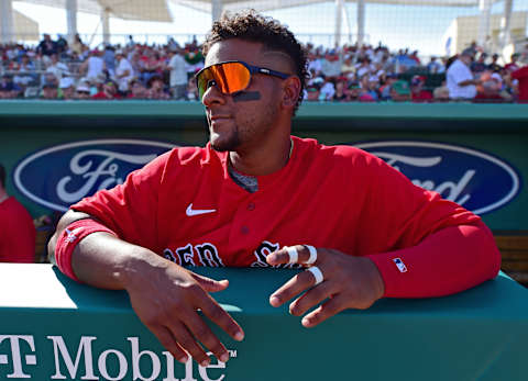 Feb 25, 2020; Fort Myers, Florida, USA; Boston Red Sox catches Roldani Baldwin (91) stands in the dugout during the sixth inning against the Baltimore Orioles at JetBlue Park. Mandatory Credit: David Dermer-USA TODAY Sports