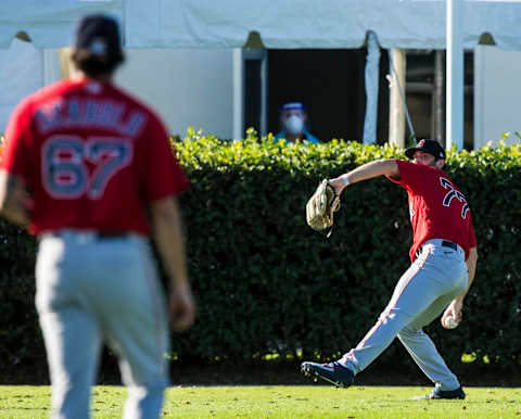 Feb 22, 2021; Fort Myers, FL, USA; Boston Red Sox pitcher Jay Groome (77) warms up during the first day Spring Training for the full squad at Jet Blue Park in Fort Myers on Monday, February 22, 2021. In the background is a medical tent. Mandatory Credit: Andrew West/The News-Press-USA TODAY Sports