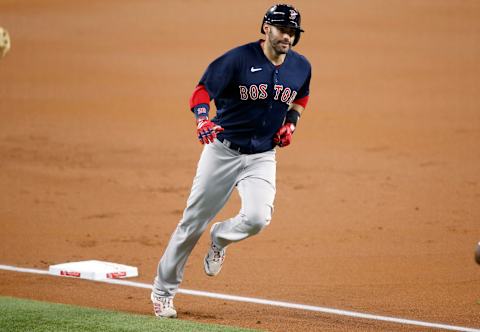 Apr 30, 2021; Arlington, Texas, USA; Boston Red Sox designated hitter J.D. Martinez (28) rounds the bases after hitting a home run in the first inning against the Texas Rangers at Globe Life Field. Mandatory Credit: Tim Heitman-USA TODAY Sports