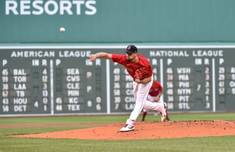 Jun 26, 2021; Boston, Massachusetts, USA; Boston Red Sox starting pitcher Nathan Eovaldi (17) pitches during the first inning against the New York Yankees at Fenway Park. Mandatory Credit: Bob DeChiara-USA TODAY Sports