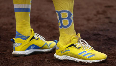 Apr 17, 2021; Boston, Massachusetts, USA; The shoes of Boston Red Sox shortstop Xander Bogaerts (2) commemorate the Boston Marathon during the sixth inning against the Chicago White Sox at Fenway Park. Mandatory Credit: Winslow Townson-USA TODAY Sports