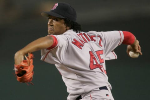 10/6/2004 — Boston Red Sox @ Anaheim Angels / Division Series Game 2 — Anaheim, CA, U.S.A: Boston starter Pedro martinez throw in the 1st inning against Anaheim during game 1 of the American League Divisional Playoffs at Angels Stadium. Photo by Robert Hanashiro, USA TODAY staff (Via MerlinFTP Drop)Xxx Angels Red Sox Martinez Rh648 Jpg S Bbn Usa Ca