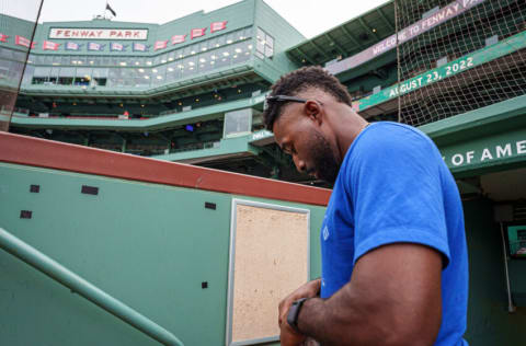 Aug 23, 2022; Boston, Massachusetts, USA; Toronto Blue Jays right fielder Jackie Bradley Jr. (25) signs autographs before the start of the game against the Boston Red Sox at Fenway Park. Mandatory Credit: David Butler II-USA TODAY Sports