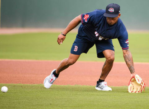 Greenville Drive’s Ceddanne Rafaela attempts to catch the ball during practice at Fluor Field Wednesday, April 6, 2022.Jm Drive 040622 003