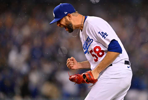 Oct 11, 2022; Los Angeles, California, USA; Los Angeles Dodgers relief pitcher Chris Martin (58) reacts after defeating the San Diego Padres during game one of the NLDS for the 2022 MLB Playoffs at Dodger Stadium. Mandatory Credit: Jayne Kamin-Oncea-USA TODAY Sports