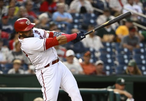 Aug 30, 2022; Washington, District of Columbia, USA; Washington Nationals designated hitter Nelson Cruz (23) hits an RBI sacrifice fly against the Oakland Athletics during the first inning at Nationals Park. Mandatory Credit: Brad Mills-USA TODAY Sports