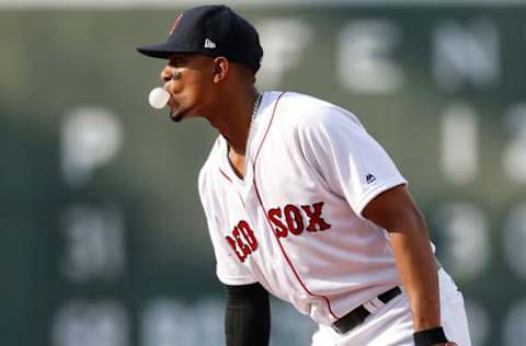 Apr 16, 2017; Boston, MA, USA; Boston Red Sox shortstop Xander Bogaerts (2) blows a bubble during the eighth inning against the Tampa Bay Rays at Fenway Park. Mandatory Credit: Greg M. Cooper-USA TODAY Sports