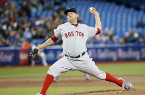 Apr 18, 2017; Toronto, Ontario, CAN; Boston Red Sox starting pitcher Brian Johnson (61) pitches to the Toronto Blue Jays during the second inning at the Rogers Centre. Mandatory Credit: John E. Sokolowski-USA TODAY Sports