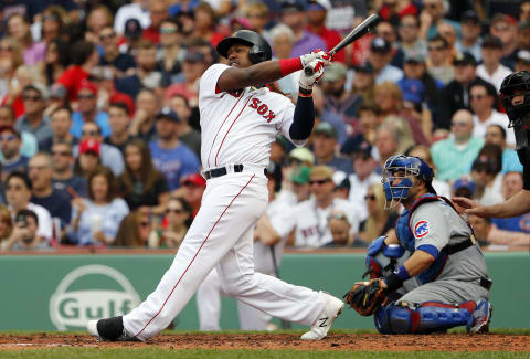 Apr 29, 2017; Boston, MA, USA; Boston Red Sox designated hitter Hanley Ramirez (13) hits a home run against the Chicago Cubs during the third inning at Fenway Park. Mandatory Credit: Winslow Townson-USA TODAY Sports