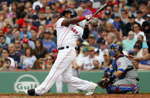 Apr 29, 2017; Boston, MA, USA; Boston Red Sox designated hitter Hanley Ramirez (13) hits a home run against the Chicago Cubs during the third inning at Fenway Park. Mandatory Credit: Winslow Townson-USA TODAY Sports