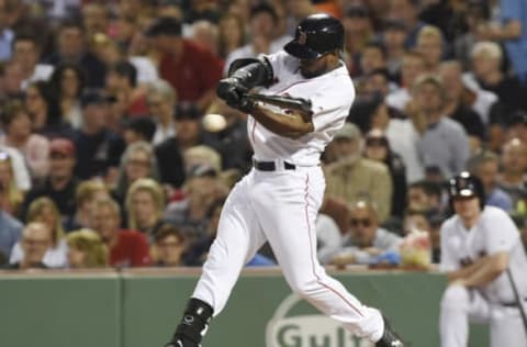 Jun 9, 2017; Boston, MA, USA; Boston Red Sox center fielder Jackie Bradley Jr. (19) hits an RBI single during the sixth inning against the Detroit Tigers at Fenway Park. Mandatory Credit: Bob DeChiara-USA TODAY Sports