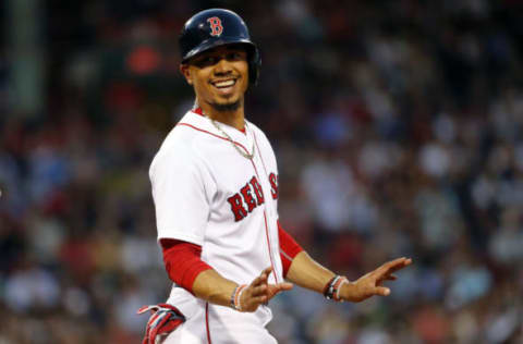 Jun 10, 2017; Boston, MA, USA; Boston Red Sox right fielder Mookie Betts (50) smiles at teammates during the third inning against the Detroit Tigers at Fenway Park. Mandatory Credit: Winslow Townson-USA TODAY Sports