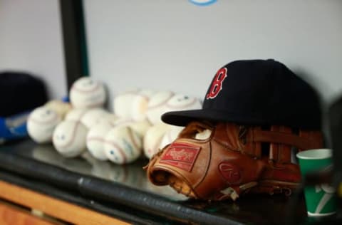 Jun 28, 2015; St. Petersburg, FL, USA; Boston Red Sox hat and glove lay in the dugout against the Tampa Bay Rays at Tropicana Field. Mandatory Credit: Kim Klement-USA TODAY Sports