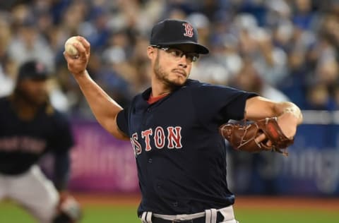 Apr 8, 2016; Toronto, Ontario, CAN; Boston Red Sox starting pitcher Joe Kelly (56) delivers a pitch against Toronto Blue Jays at Rogers Centre. Mandatory Credit: Dan Hamilton-USA TODAY Sports