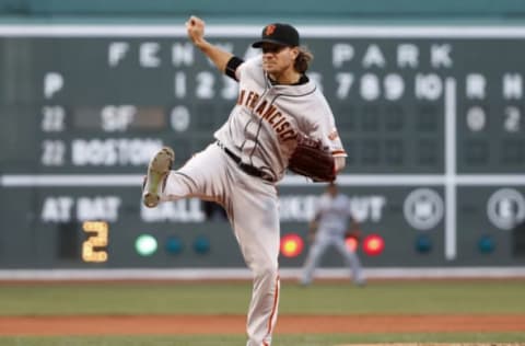 Jul 19, 2016; Boston, MA, USA; San Francisco Giants starting pitcher Jake Peavy (22) follows through on a pitch against the Boston Red Sox during the first inning at Fenway Park. Mandatory Credit: Winslow Townson-USA TODAY Sports