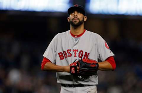 Sep 27, 2016; Bronx, NY, USA; Boston Red Sox starting pitcher David Price (24) reacts after giving up a two-run home run to New York Yankees first baseman Tyler Austin (26) during the seventh inning at Yankee Stadium. Mandatory Credit: Adam Hunger-USA TODAY Sports