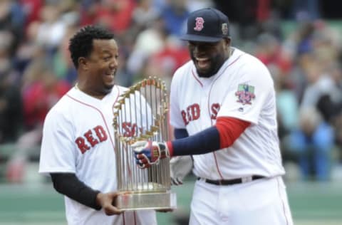 Oct 2, 2016; Boston, MA, USA; Former Boston Red Sox pitcher Pedro Martinez shares a laugh with designated hitter David Ortiz (34) prior to a game against the Toronto Blue Jays at Fenway Park. Mandatory Credit: Bob DeChiara-USA TODAY Sports