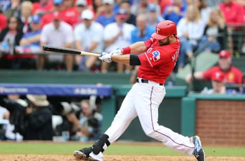 Oct 7, 2016; Arlington, TX, USA; Texas Rangers first baseman Mitch Moreland (18) doubles against the Toronto Blue Jays during the eighth inning of game two of the 2016 ALDS playoff baseball series at Globe Life Park in Arlington. Mandatory Credit: Kevin Jairaj-USA TODAY Sports