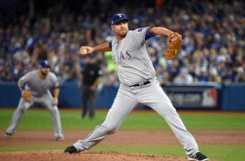 Oct 9, 2016; Toronto, Ontario, CAN; Texas Rangers starting pitcher Colby Lewis throws a pitch against the Toronto Blue Jays in the second inning during game three of the 2016 ALDS playoff baseball series at Rogers Centre. Mandatory Credit: Dan Hamilton-USA TODAY Sports