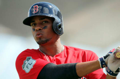 Feb 27, 2017; Fort Myers, FL, USA; Boston Red Sox shortstop Xander Bogaerts (2) on deck to bat against the St. Louis Cardinals at JetBlue Park. Mandatory Credit: Kim Klement-USA TODAY Sports