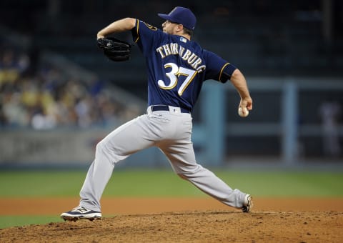 June 16, 2016; Los Angeles, CA, USA; Milwaukee Brewers relief pitcher Tyler Thornburg (37) throws in the eighth inning against Los Angeles Dodgers at Dodger Stadium. Mandatory Credit: Gary A. Vasquez-USA TODAY Sports