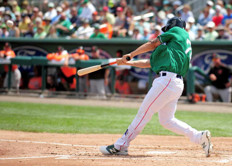 Mar 17, 2016; Fort Myers, FL, USA; Boston Red Sox first baseman Sam Travis (74) hits a home run in the second inning against the Baltimore Orioles at JetBlue Park. Mandatory Credit: Evan Habeeb-USA TODAY Sports