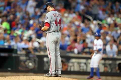 Jul 7, 2016; New York City, NY, USA; Washington Nationals starting pitcher Lucas Giolito (44) reacts after a balk allowing New York Mets right fielder Curtis Granderson (3) to reach third base during the fourth inning at Citi Field. Mandatory Credit: Brad Penner-USA TODAY Sports