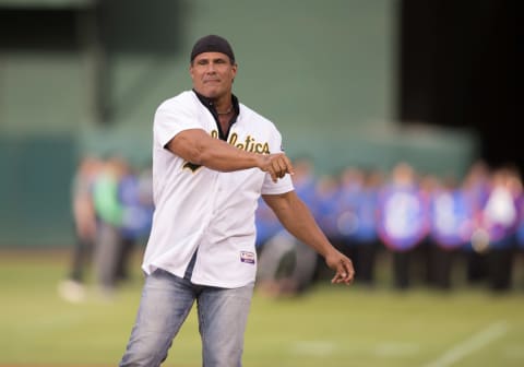 Sep 3, 2016; Oakland, CA, USA; Oakland Athletics former player Jose Canseco throws out the first pitch of the game between the Boston Red Sox and the Oakland Athletics at Oakland Coliseum. Mandatory Credit: Neville E. Guard-USA TODAY Sports