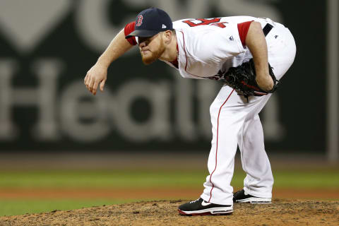 Oct 10, 2016; Boston, MA, USA; Boston Red Sox relief pitcher Craig Kimbrel (46) prepares to deliver a pitch in the eighth inning against the Cleveland Indians during game three of the 2016 ALDS playoff baseball series at Fenway Park. Mandatory Credit: Greg M. Cooper-USA TODAY Sports