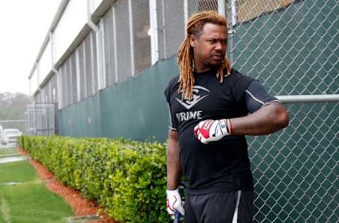 Feb 22, 2017; Ft. Myers, FL, USA; Boston Red Sox first baseman Hanley Ramirez (13) walks into the rain from the batting cages during spring training at JetBlue Park. Mandatory Credit: Kim Klement-USA TODAY Sports