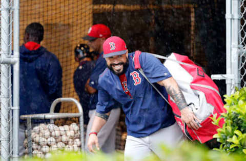 Feb 22, 2017; Ft. Myers, FL, USA; Boston Red Sox catcher Sandy Leon (3) works out as it rains during spring training at JetBlue Park. Mandatory Credit: Kim Klement-USA TODAY Sports