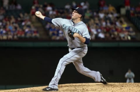 Aug 18, 2015; Arlington, TX, USA; Seattle Mariners relief pitcher Carson Smith (39) pitches against the Texas Rangers during the ninth inning and gets the save at Globe Life Park in Arlington. The Mariners defeat the Rangers 3-2. Mandatory Credit: Jerome Miron-USA TODAY Sports