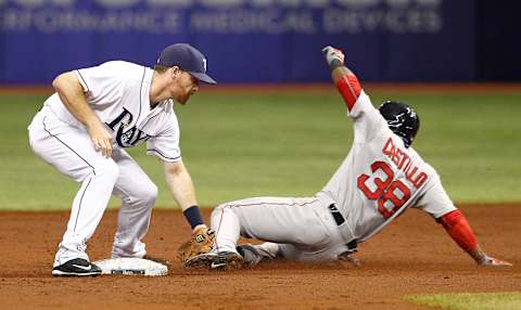 Sep 12, 2015; St. Petersburg, FL, USA; Tampa Bay Rays second baseman Logan Forsythe (11) tags out Boston Red Sox right fielder Rusney Castillo (38) to end the second inning during a baseball game at Tropicana Field. Mandatory Credit: Reinhold Matay-USA TODAY Sports