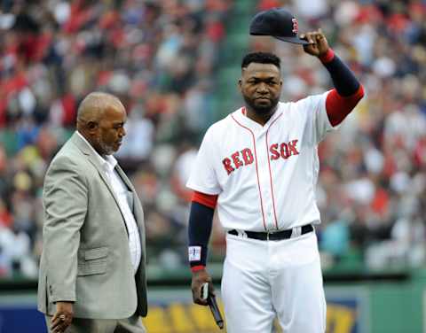 Oct 2, 2016; Boston, MA, USA; Boston Red Sox designated hitter David Ortiz (34) with his dad Enrique Ortiz during pre game ceremonies prior to a game against the Toronto Blue Jays at Fenway Park. Mandatory Credit: Bob DeChiara-USA TODAY Sports