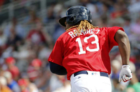 Feb 27, 2017; Fort Myers, FL, USA;Boston Red Sox first baseman Hanley Ramirez (13) singles during the third inning against the St. Louis Cardinals at JetBlue Park. Mandatory Credit: Kim Klement-USA TODAY Sports