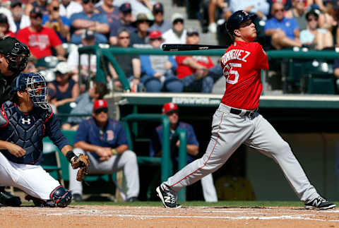 Mar 3, 2017; Lake Buena Vista, FL, USA; Boston Red Sox third baseman Matt Dominguez (65) hits an RBI sacrifice fly to right during the fourth inning of an MLB spring training baseball game against the Atlanta Braves at Champion Stadium. Mandatory Credit: Reinhold Matay-USA TODAY Sports