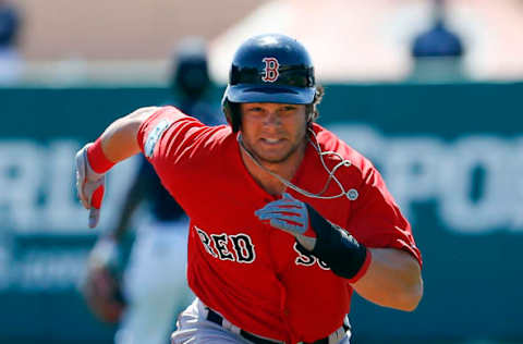 Mar 3, 2017; Lake Buena Vista, FL, USA; Boston Red Sox left fielder Andrew Benintendi (16) runs to third after tagging on a sacrifice fly during the first inning of an MLB spring training baseball game against the Atlanta Braves at Champion Stadium. Mandatory Credit: Reinhold Matay-USA TODAY Sports